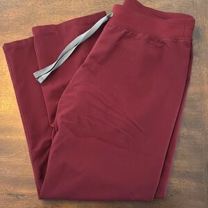 Size medium petite FIGS scrub bottoms. Red. Gray draw strings